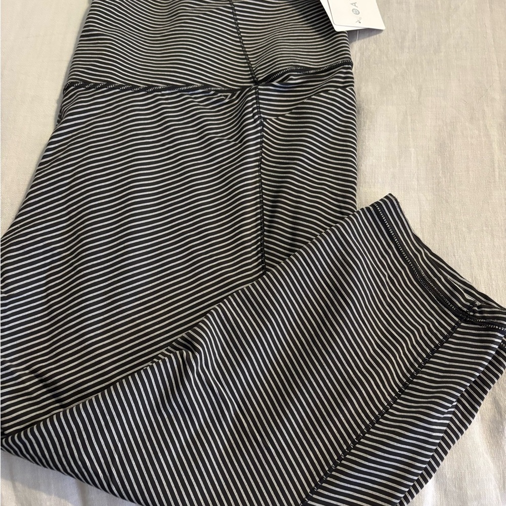 Athleta Black and White Athletic Leggings with Pinstripe Design